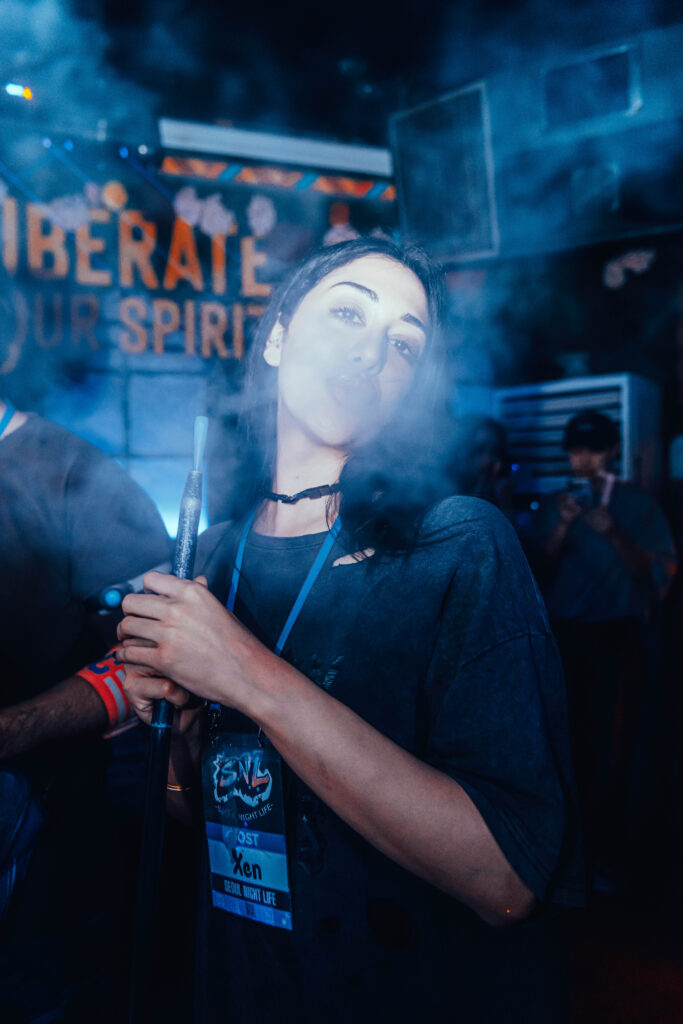 host smoking hookah