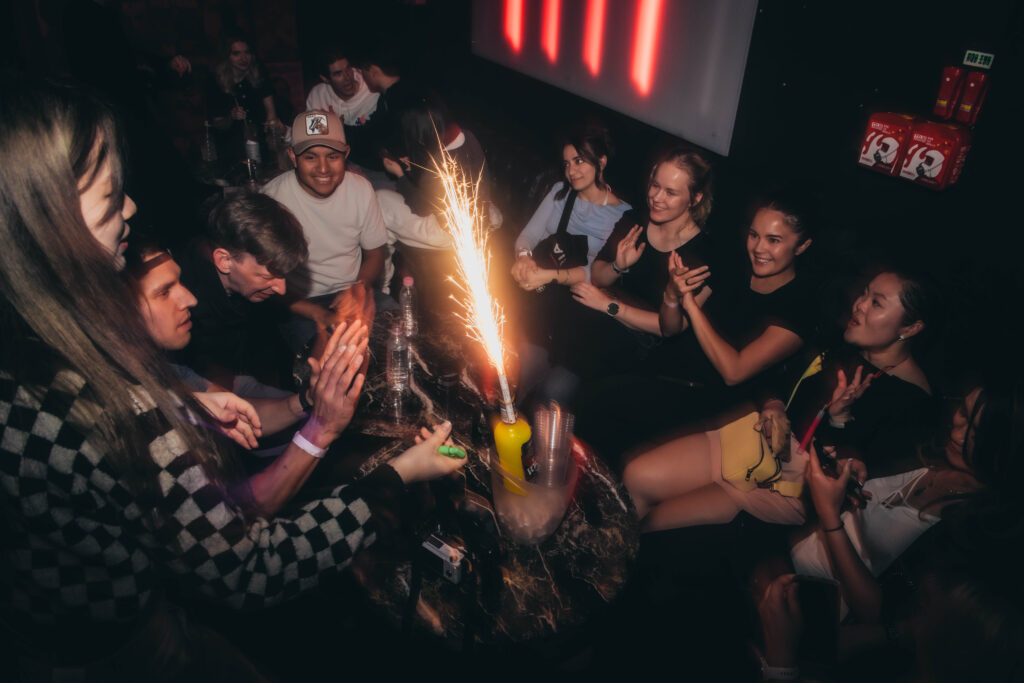 Guests enjoying sparklers at a Seoul nightclub