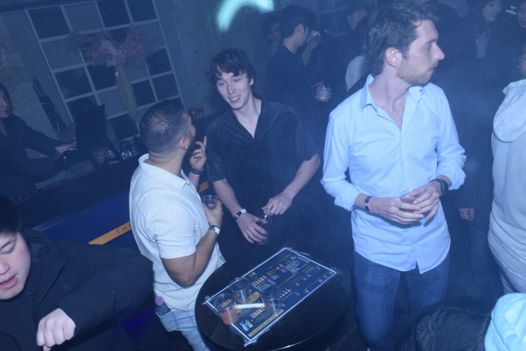 Guests partying together at a Seoul nightclub