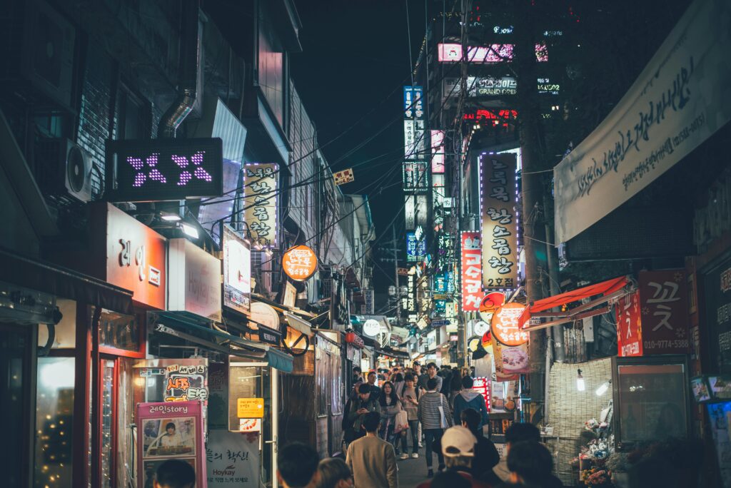 Seoul nightlife streets with neon lights. solo clubbing, club solo
