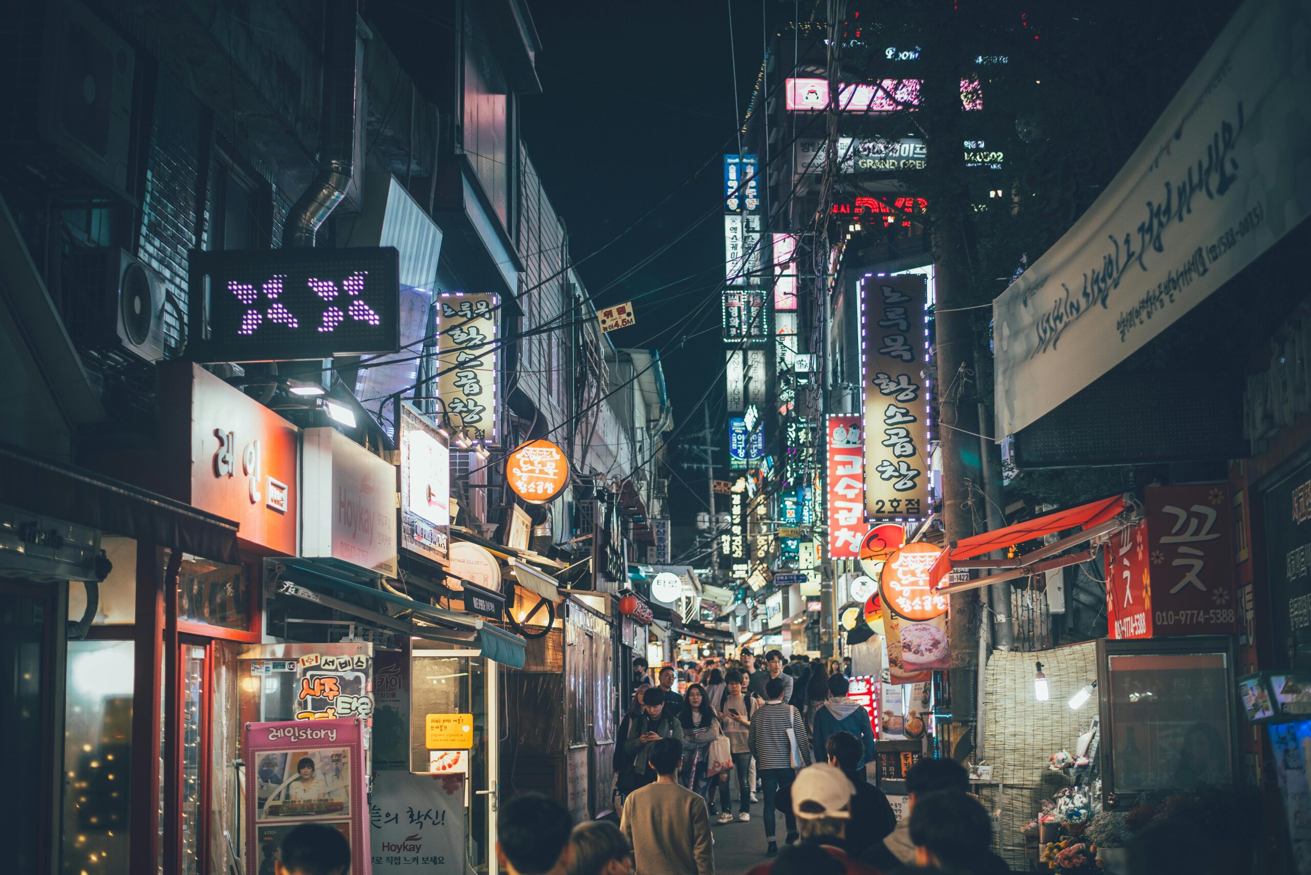 Seoul nightlife streets with neon lights. solo clubbing, club solo
