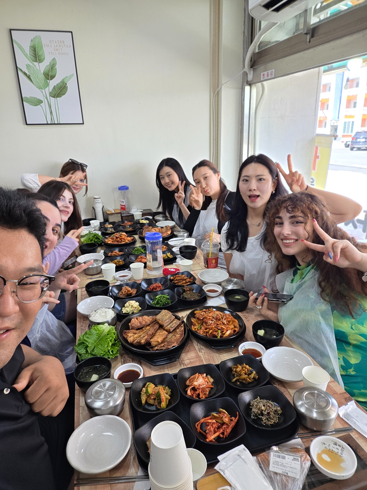 Seoul Night Life guests sharing a Korean meal together