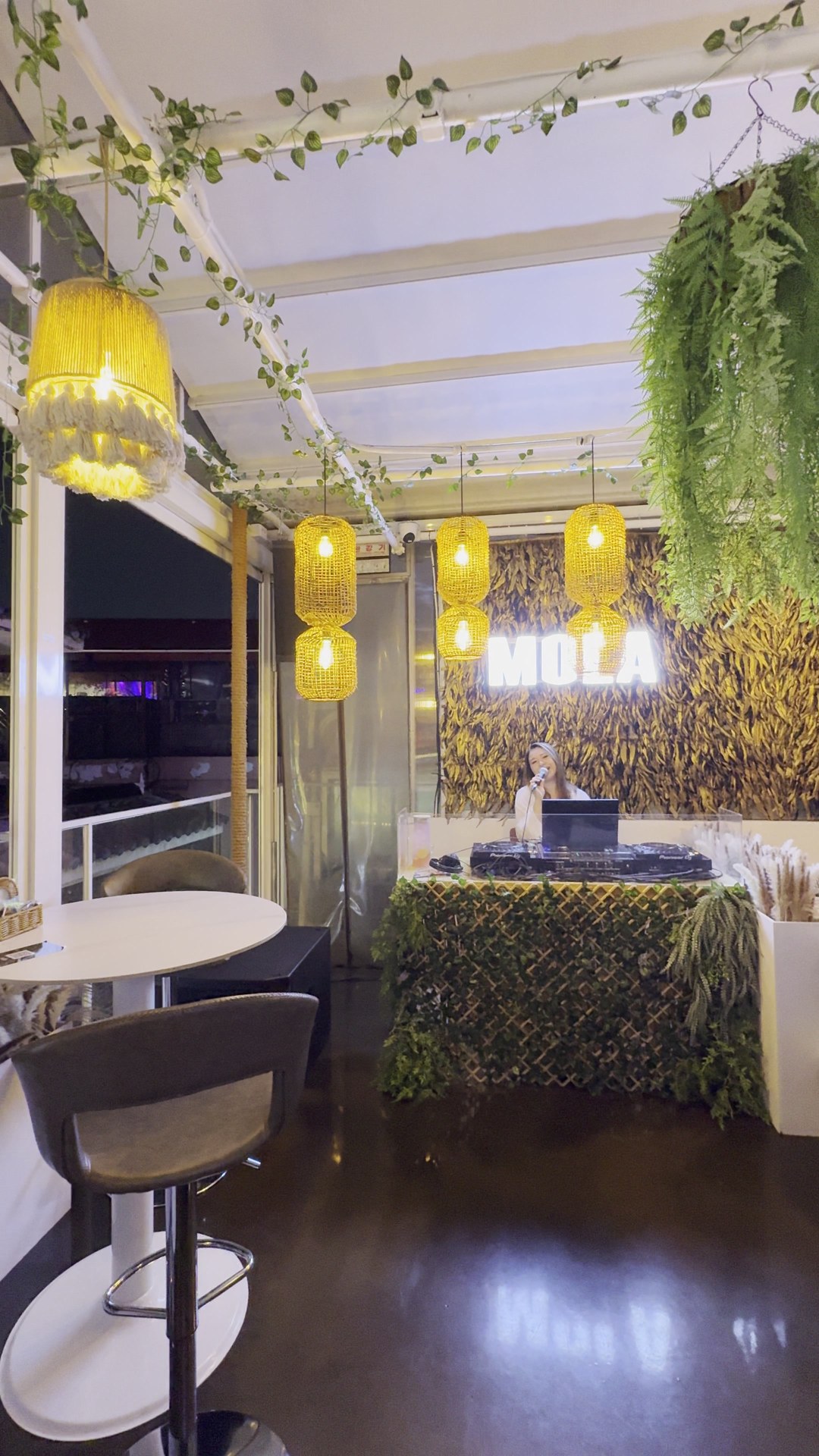 MOLA lounge seating, pendant lights and music setup