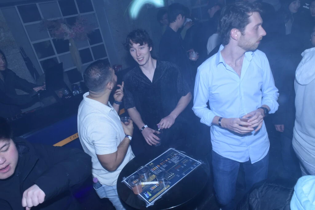 Guests partying together at a Seoul nightclub