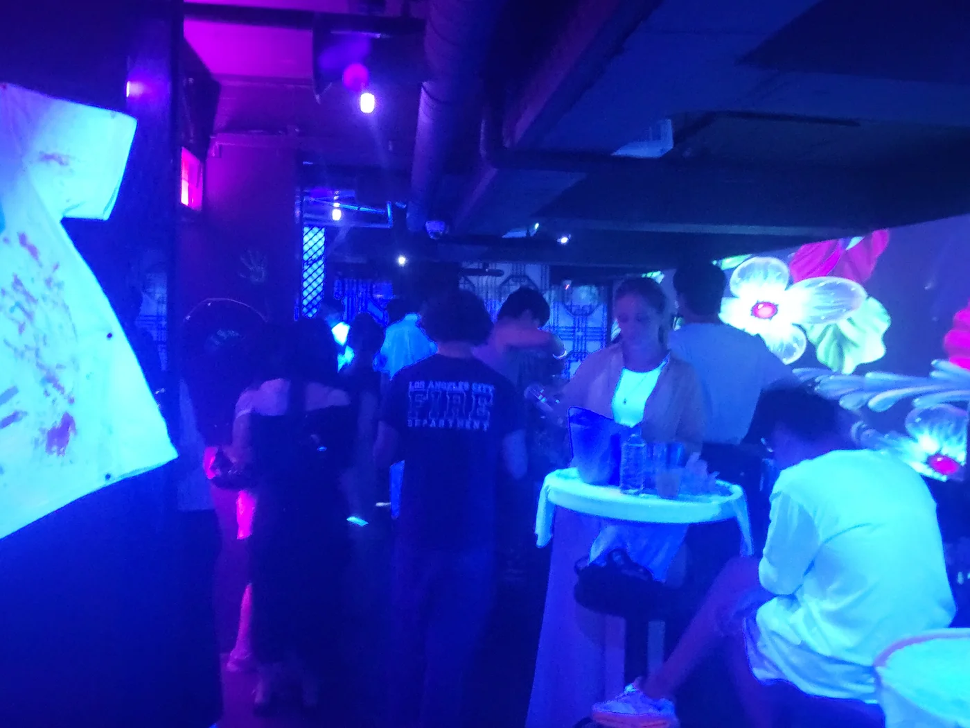 Blue lighting and wall projections inside Pungwol
