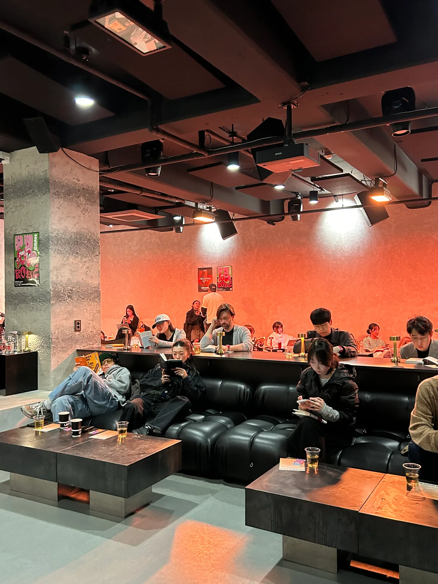 Sofa seating and low tables inside UNDERCITY